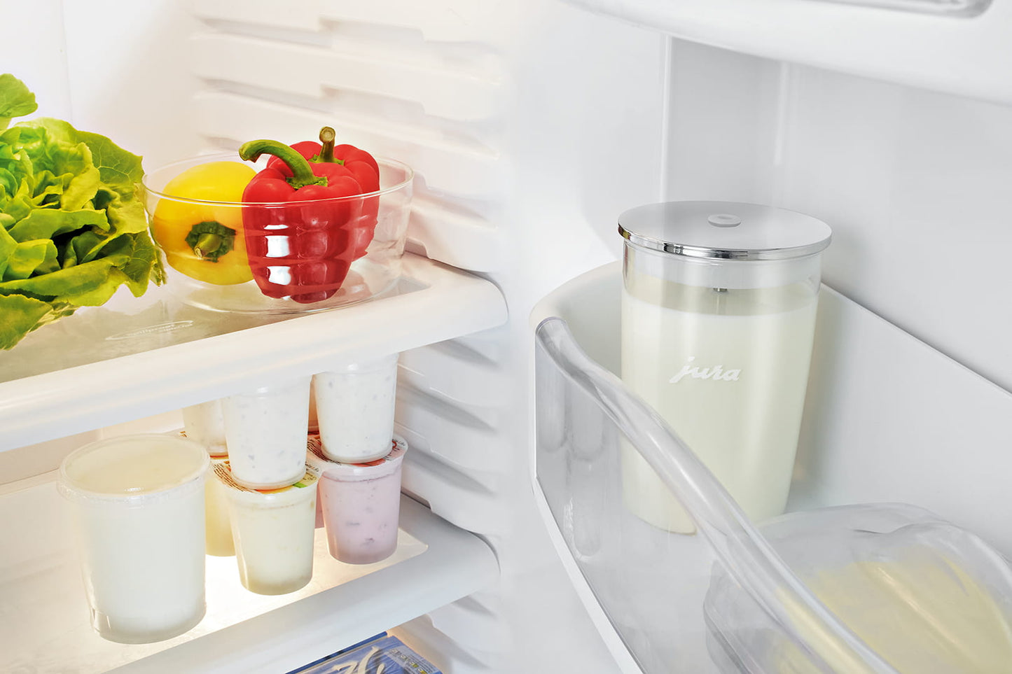 Jura milk container connected to espresso machine